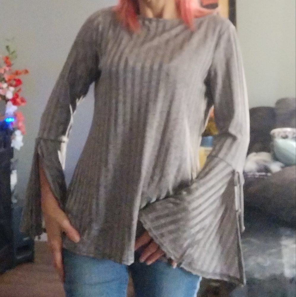 Bell sleeved top